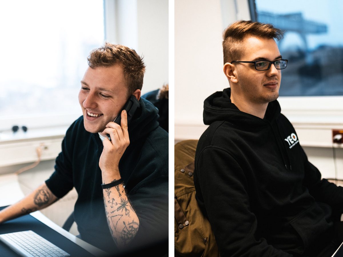 Zwei Teammitglieder von YEO bei der Arbeit im Büro
